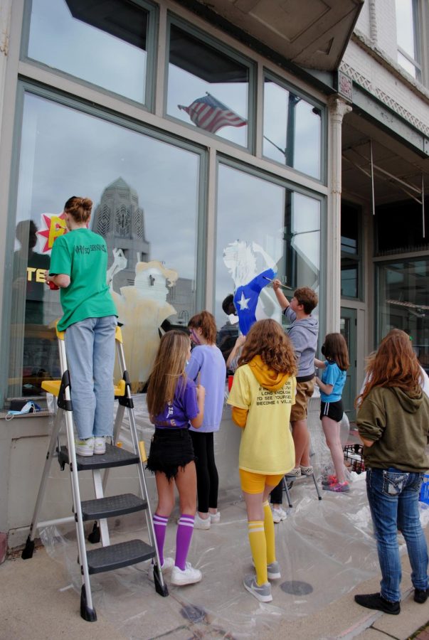 Gallery: Homecoming Window Painting in Downtown St. Charles