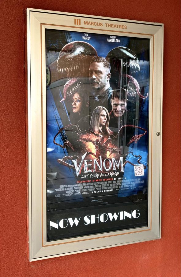 A movie poster displaying Venom: Let There Be Carnage