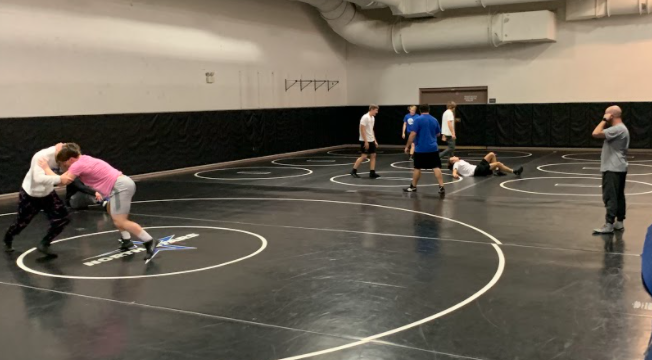 The+North+wrestling+team+practices+after+school+in+the+gym+mezzanine.+