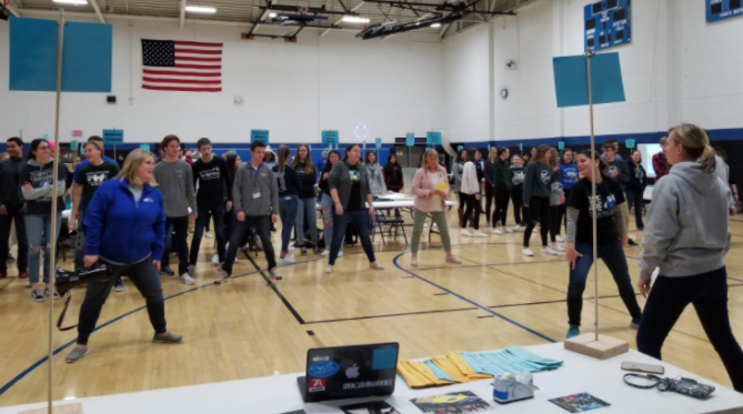 Team Polaris members teach students the Project Dance morale dance at Future Freshman Athletics and Activities Information Night two years ago.
