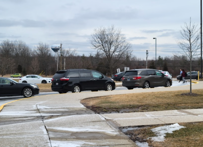 Cars back up as they try to leave onto Route 31.