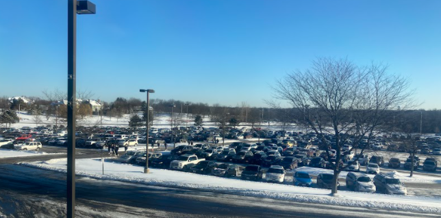 The parking lot during the day is always full.
