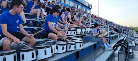 Pep Band plays during a soccer game May 12.
