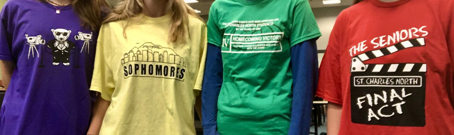 Students model the 2022 Homecoming t-shirts