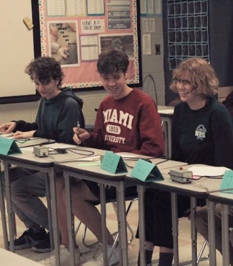 Norths varsity Scholastic Bowl team prepares for the meet.