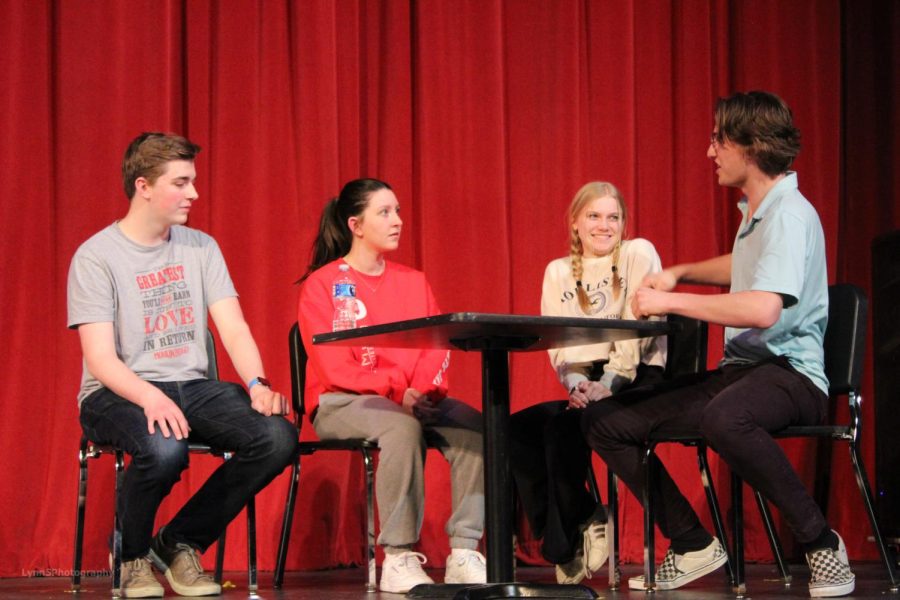 Juniors Atticus Pixton and Derek Hibben and freshmen Abby Potts and Reagan Jorgenson rehearse for the one acts.