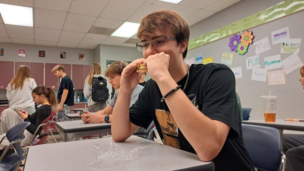 Senior Nolan Brown eats lunch at the beginning of class.