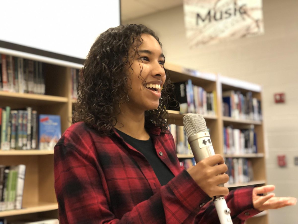 Senior Jakelyn Leycock demonstrating a performance for Open Mic Night. 