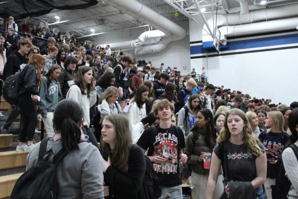 Students filing out of gym after 2024 spring pep assembly on April 12.