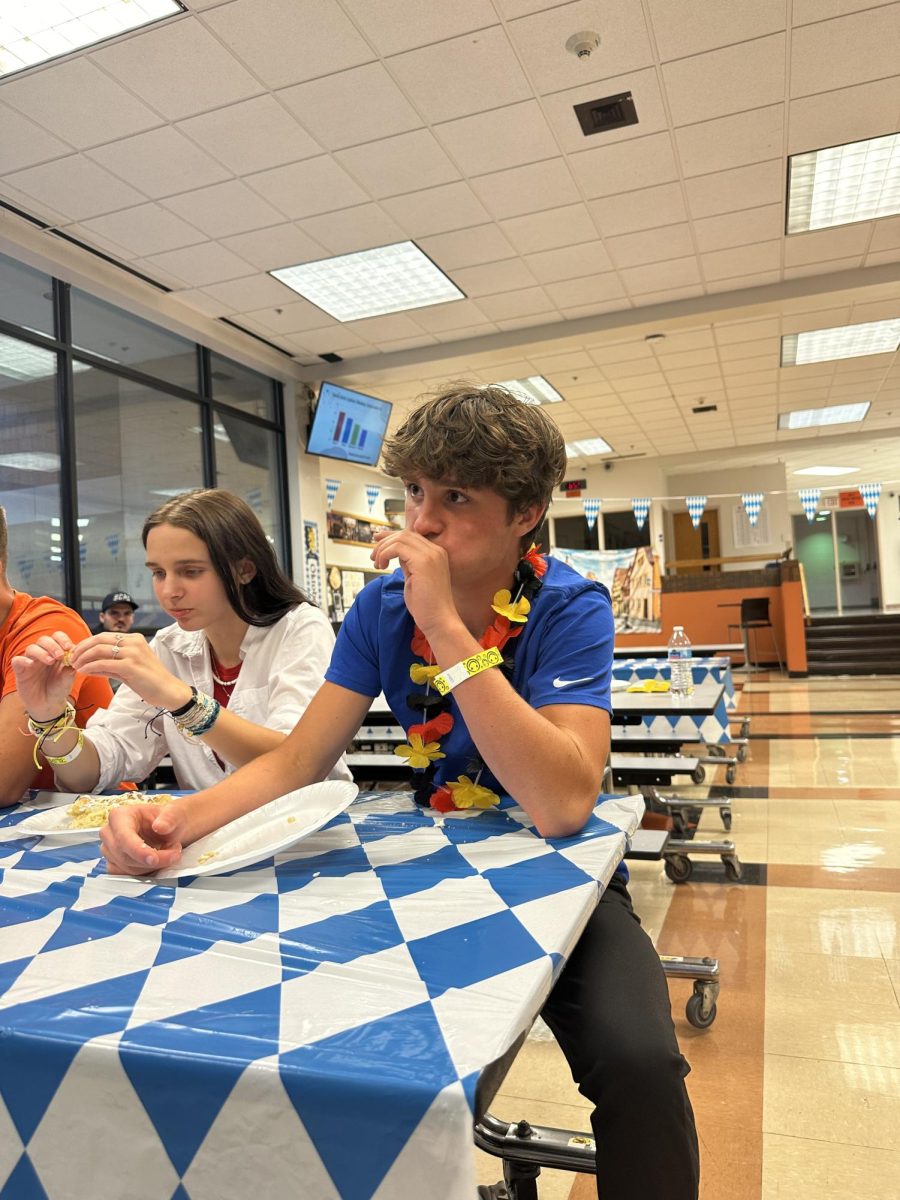 Juniors Amanda Fredres and Keelan Kassenbrock participating in the strudel-eating competition.