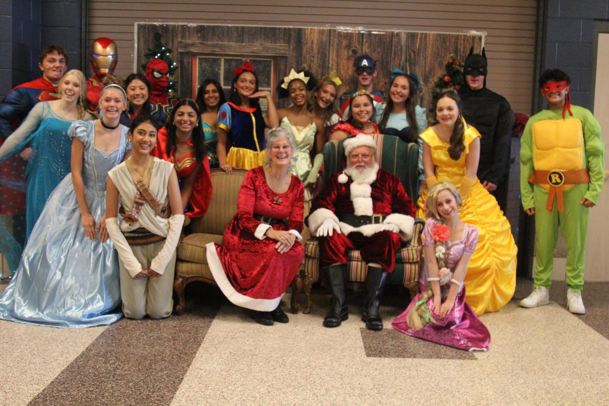 Student council members with Santa and Mrs. Claus.