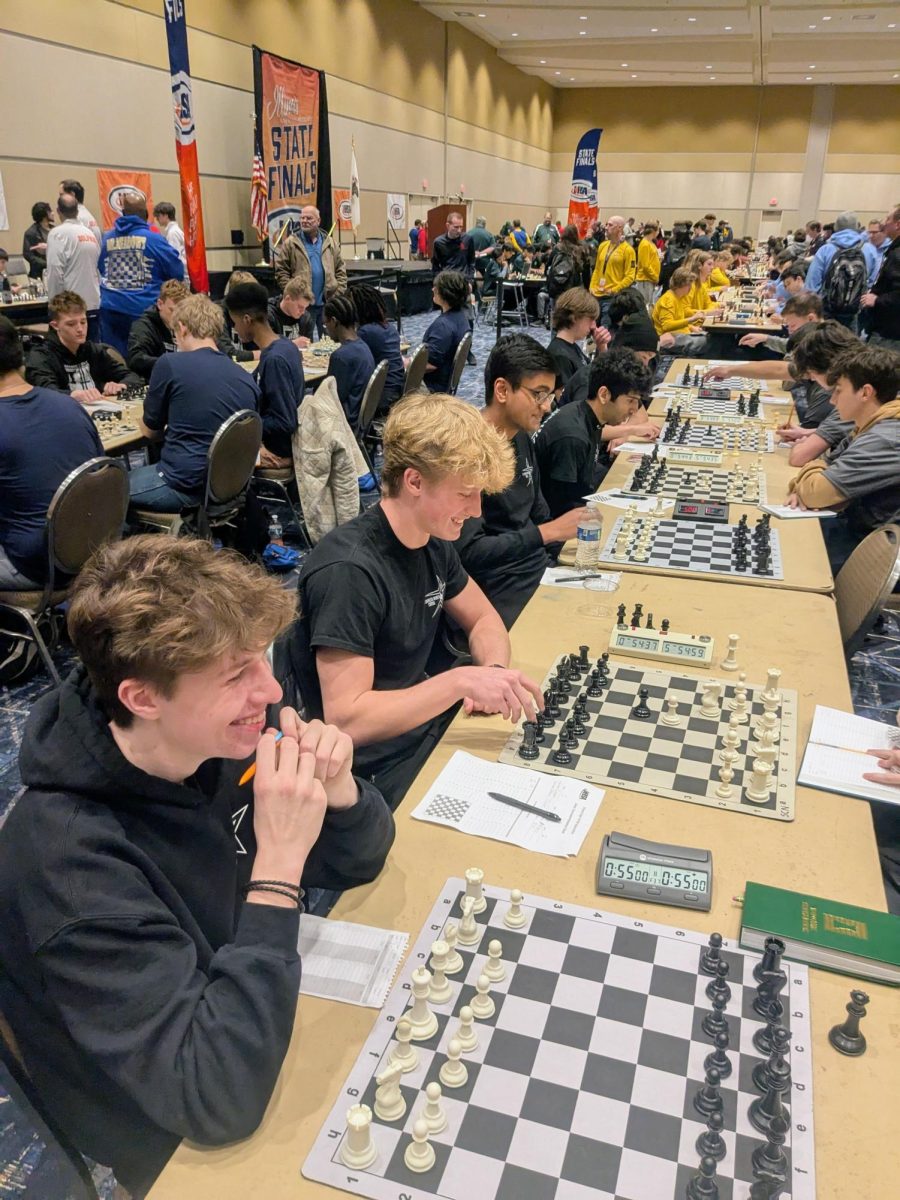 Seniors Ryan Winter,  Isaac Piper and Ayan Soni and sophomore Atharv Sood at the IHSA state chess competition.