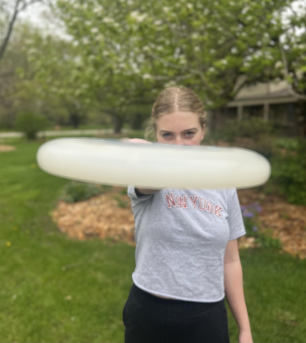 Sage Riordan ready to throw her frisbee.