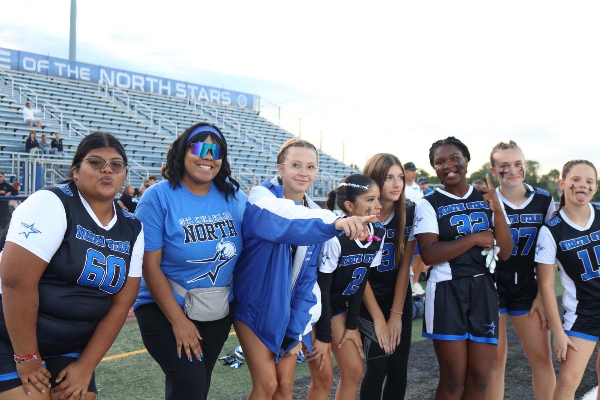 Girls flag football coach Ashley Jackson with the team.