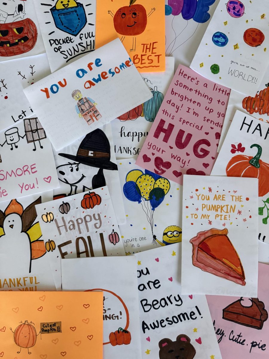 Members of Letters of Love make handmade cards to support children in hospitals.