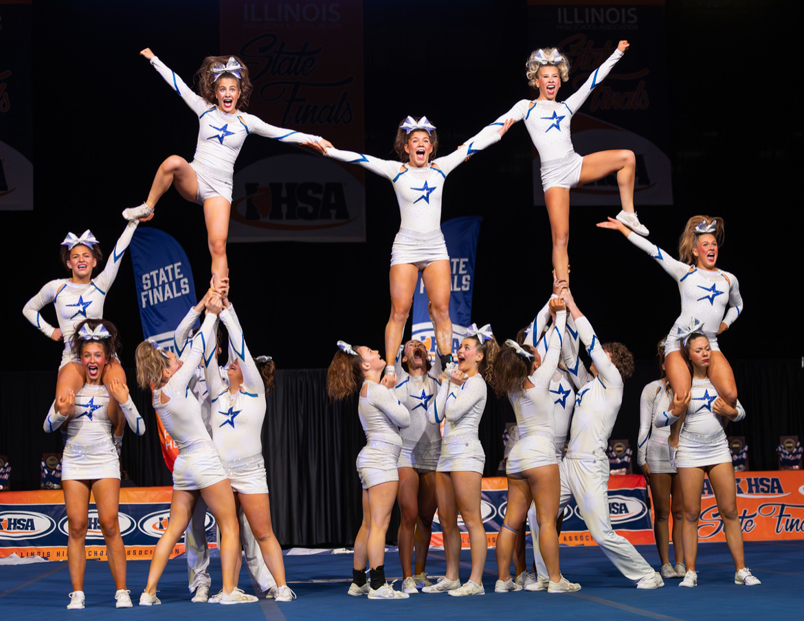 The cheer team performing their routine during the state finals