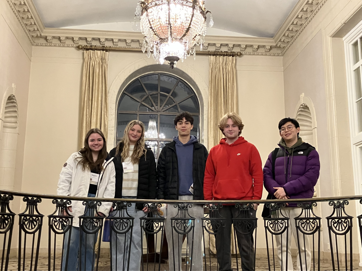 (From left to right) East seniors Delaney Gerard and Taylor Long, East Junior Jason Atienza, North junior Kenny Chang and North senior Riley Stitz at IMEC.