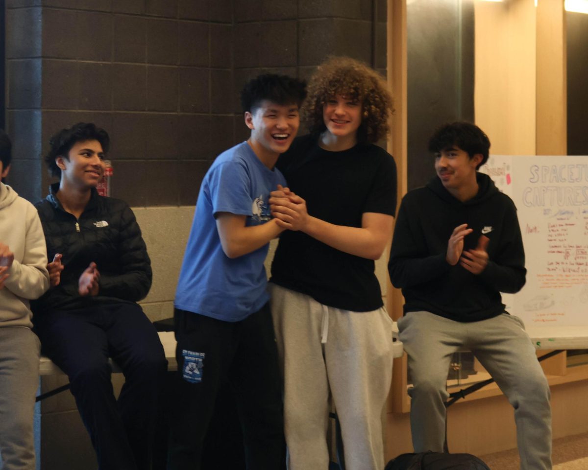 Juniors Michael Li and Alexander Jones celebrating winning the most original award infront of junior Mustafa Abdallah and sophomores Ved Bhagat and Ryyhan Essani. 