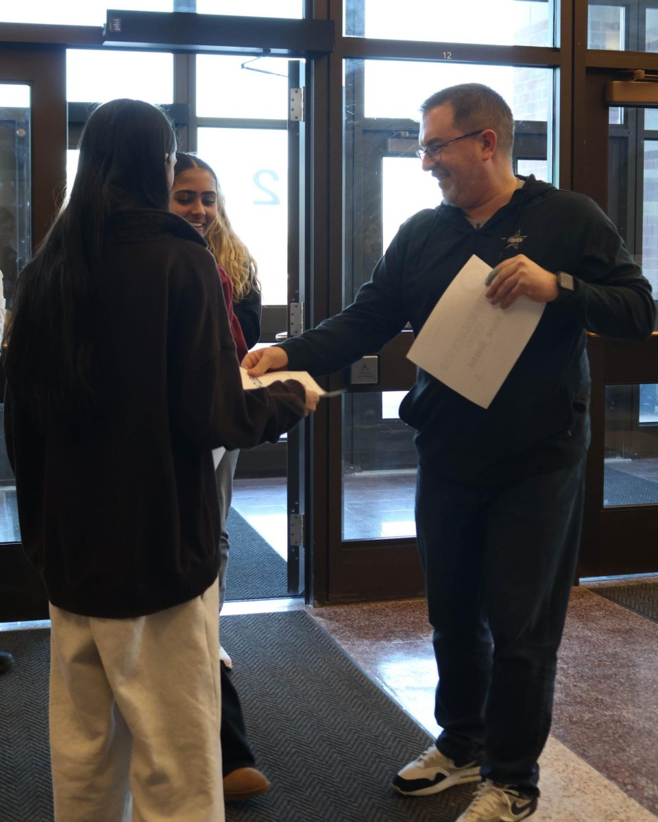 Peter Gleason, sophomore Gargi Patel and senior Radha Patel