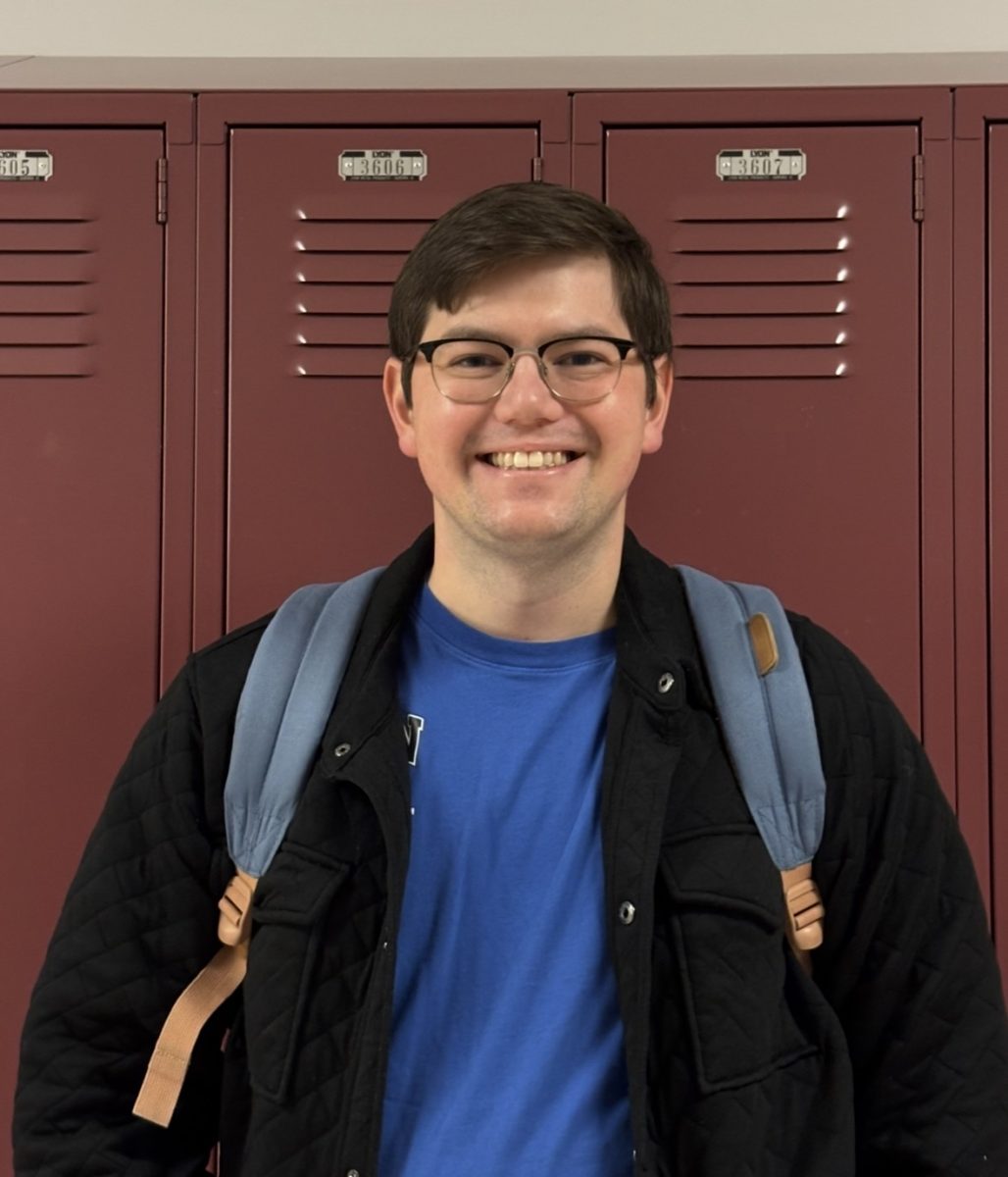 Zachary Gleason helps students in his first year at North.