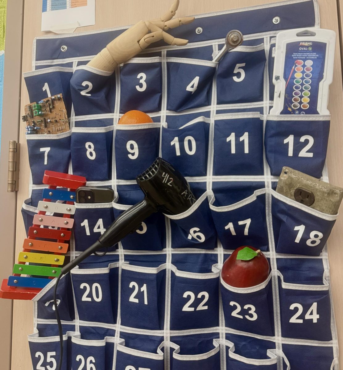 A phone caddy full of replacements during the school day.