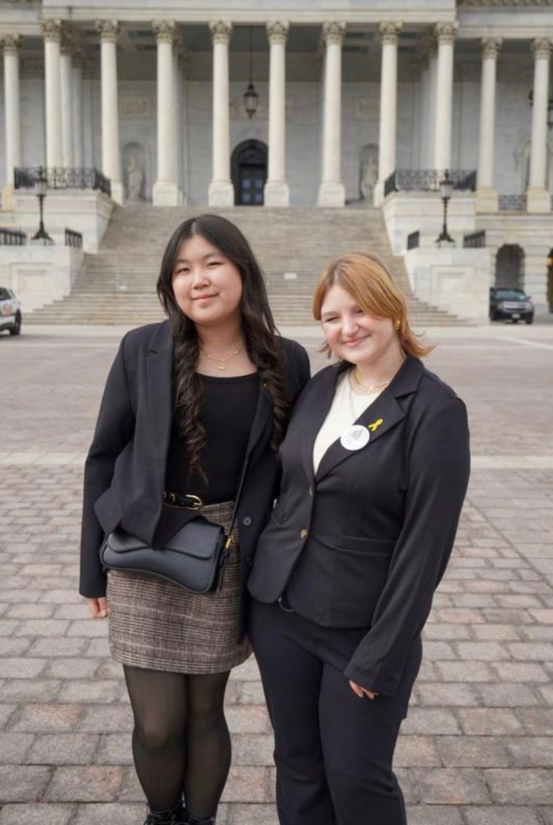 Juniors Ella Joy Won and Ireland Nolan in front of the U.S. Capitol Building