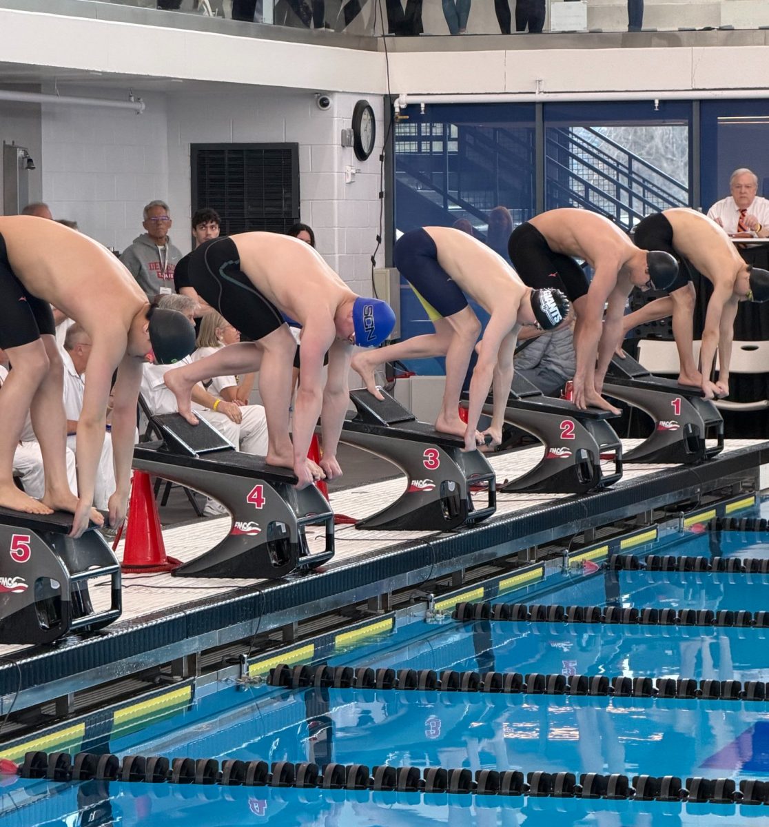North lined up on the starting block ready to start race at state 